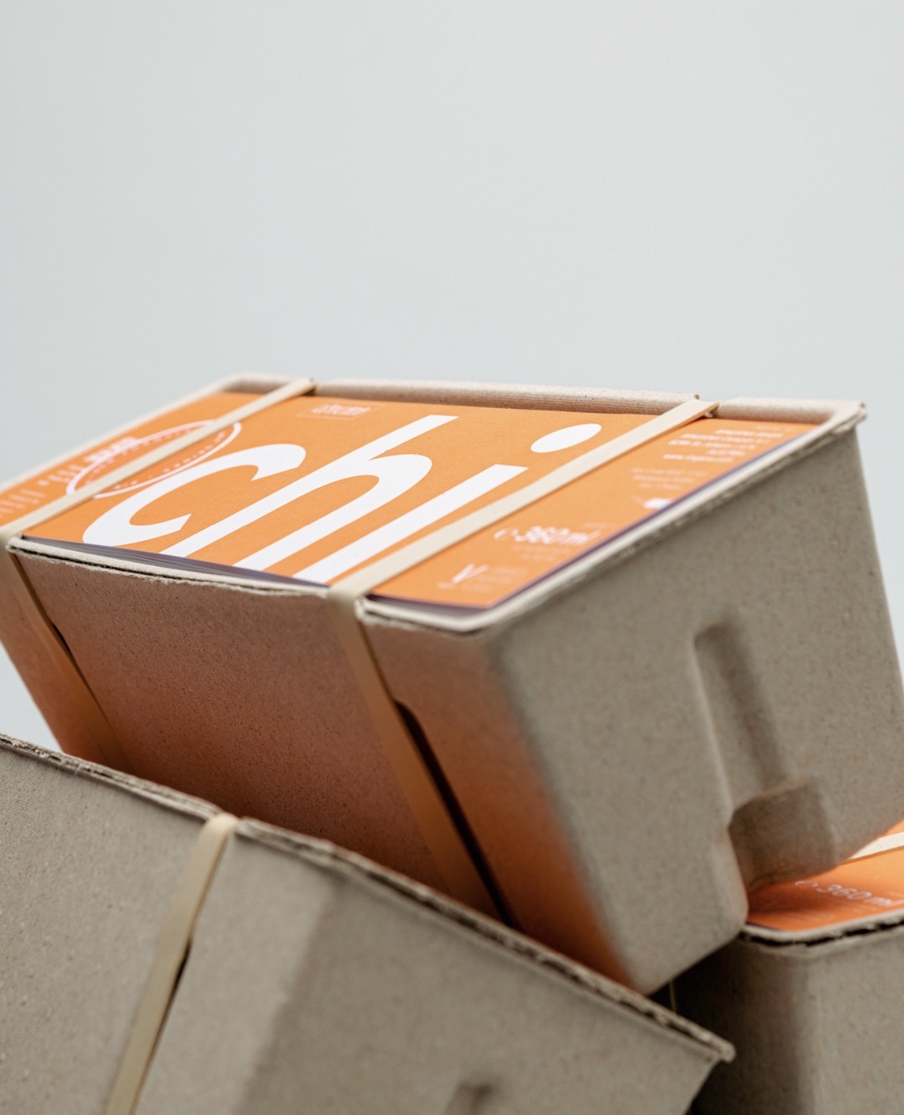 Product cartons with orange labels